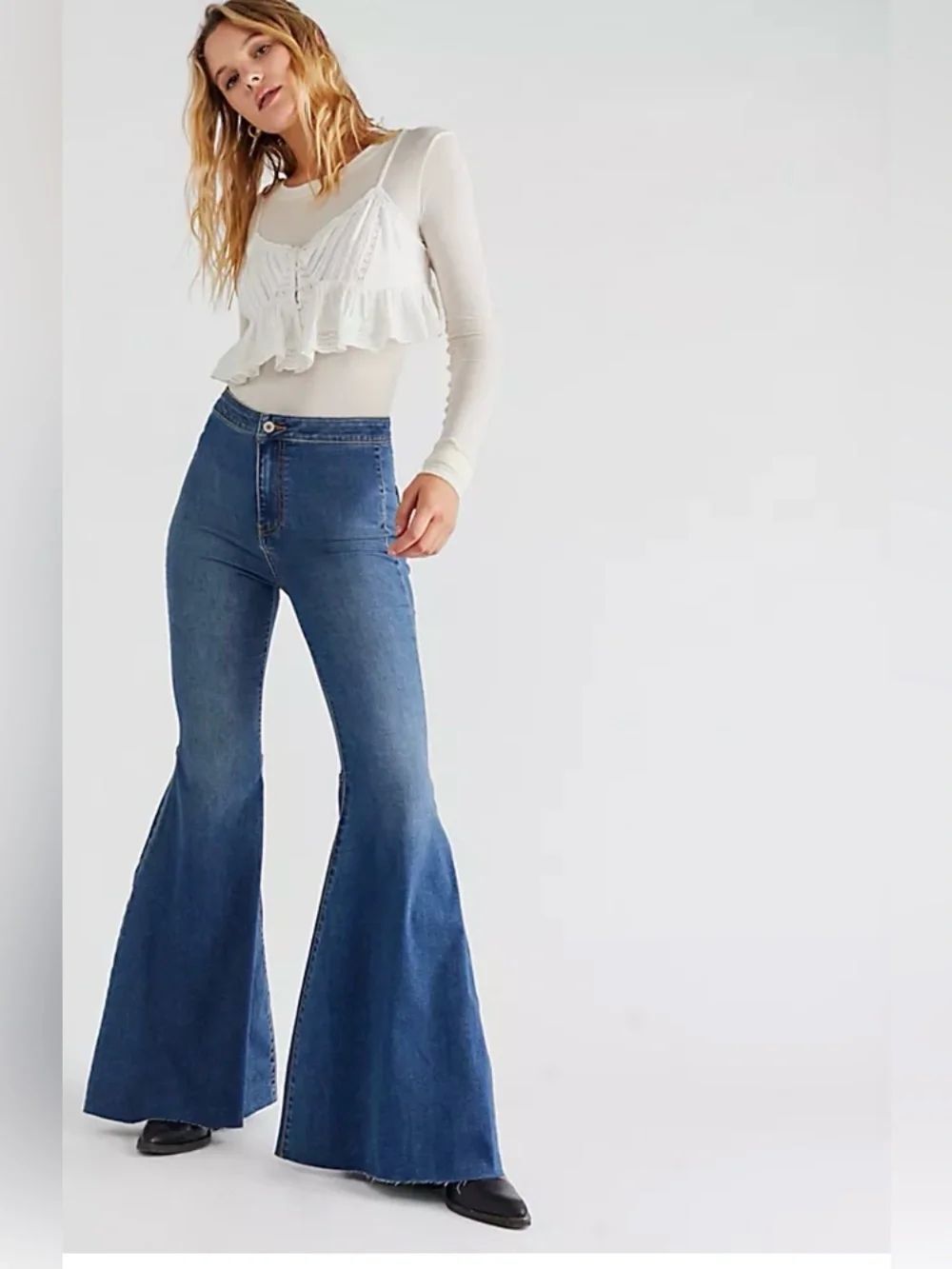 Free People "Just Float On" flare jeans a high-rise waist and bell bottom 31